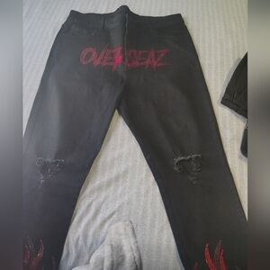Elegant Black Jeans with Red Flame Accents